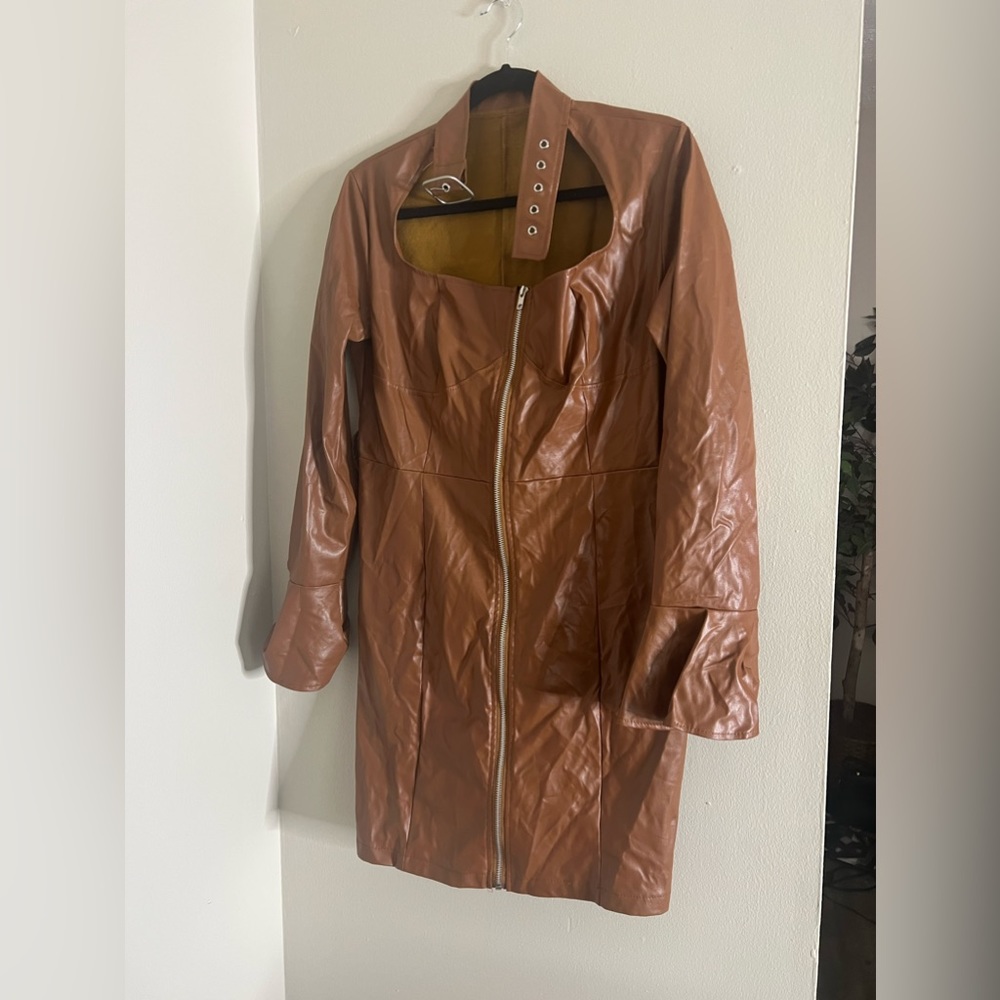 leather dress. with belted neck .